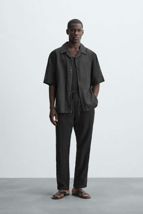 RELAXED FIT TEXTURED TROUSERS - Image 1
