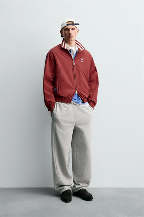 CHAMPION ® X TECHNICAL PATCH JACKET - Image 1