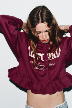 Ruffle-Trimmed Varsity Sweatshirt