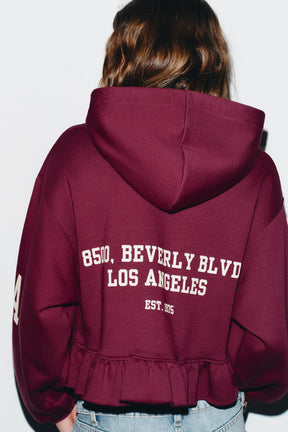 Ruffle-Trimmed Varsity Sweatshirt