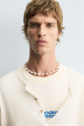 T-SHIRT WITH CONTRAST PRINTS - Image 6