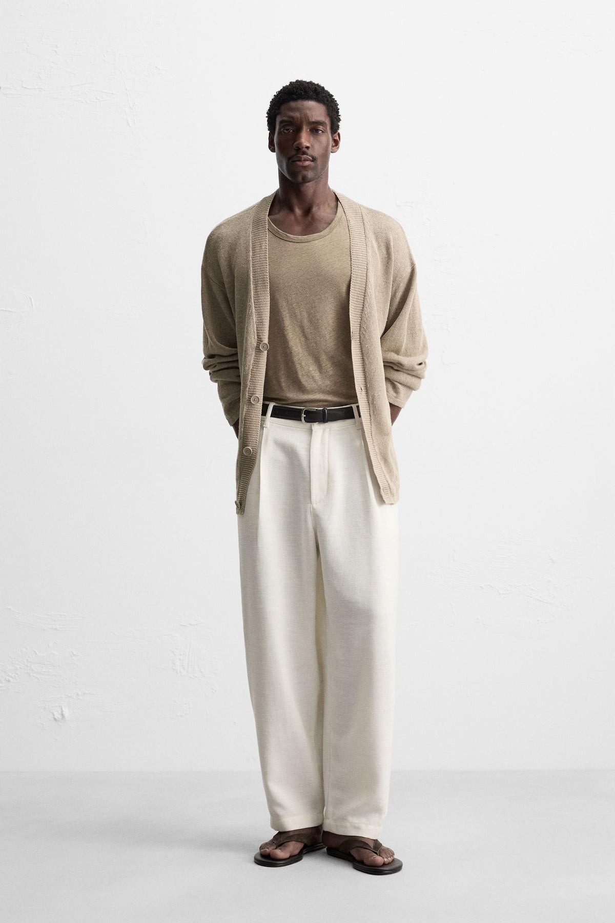 RELAXED FIT PLEATED TROUSERS - Image 1