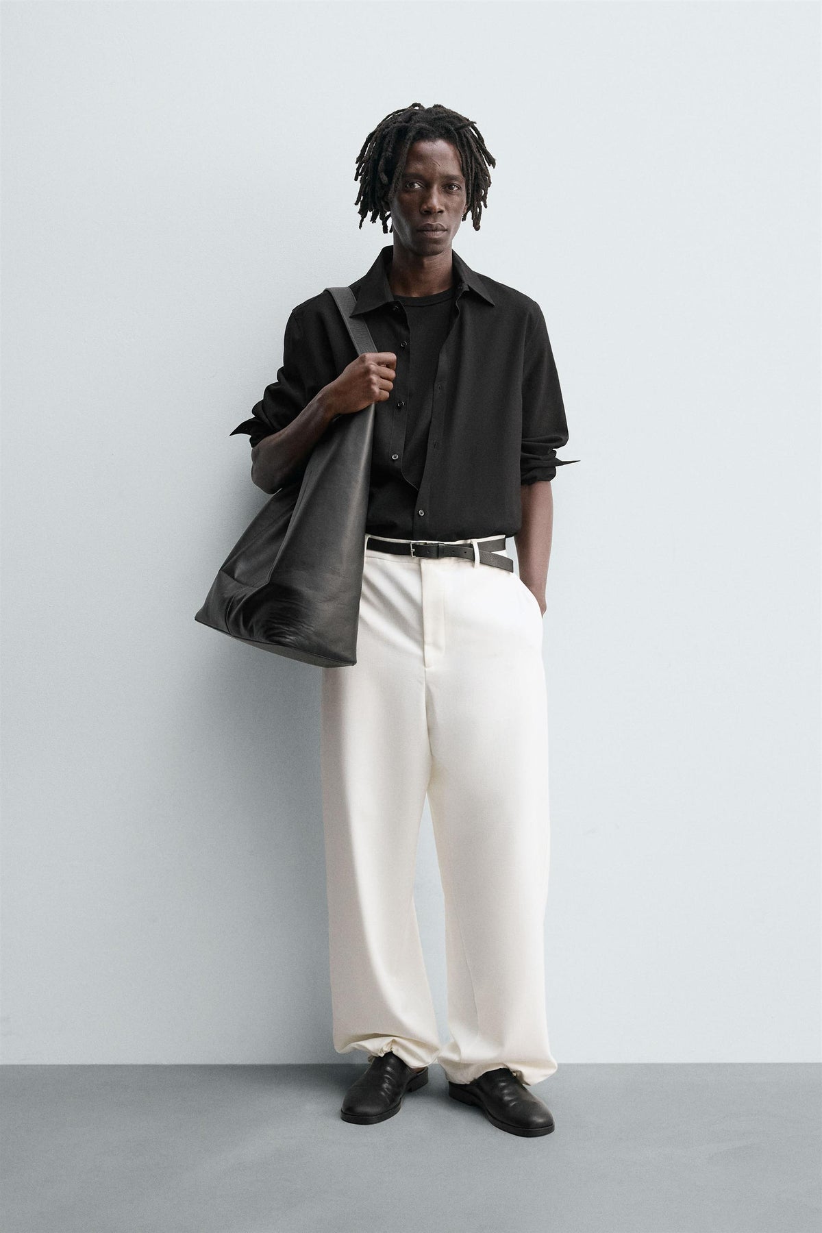 TEXTURED RELAXED FIT TROUSERS - Image 1