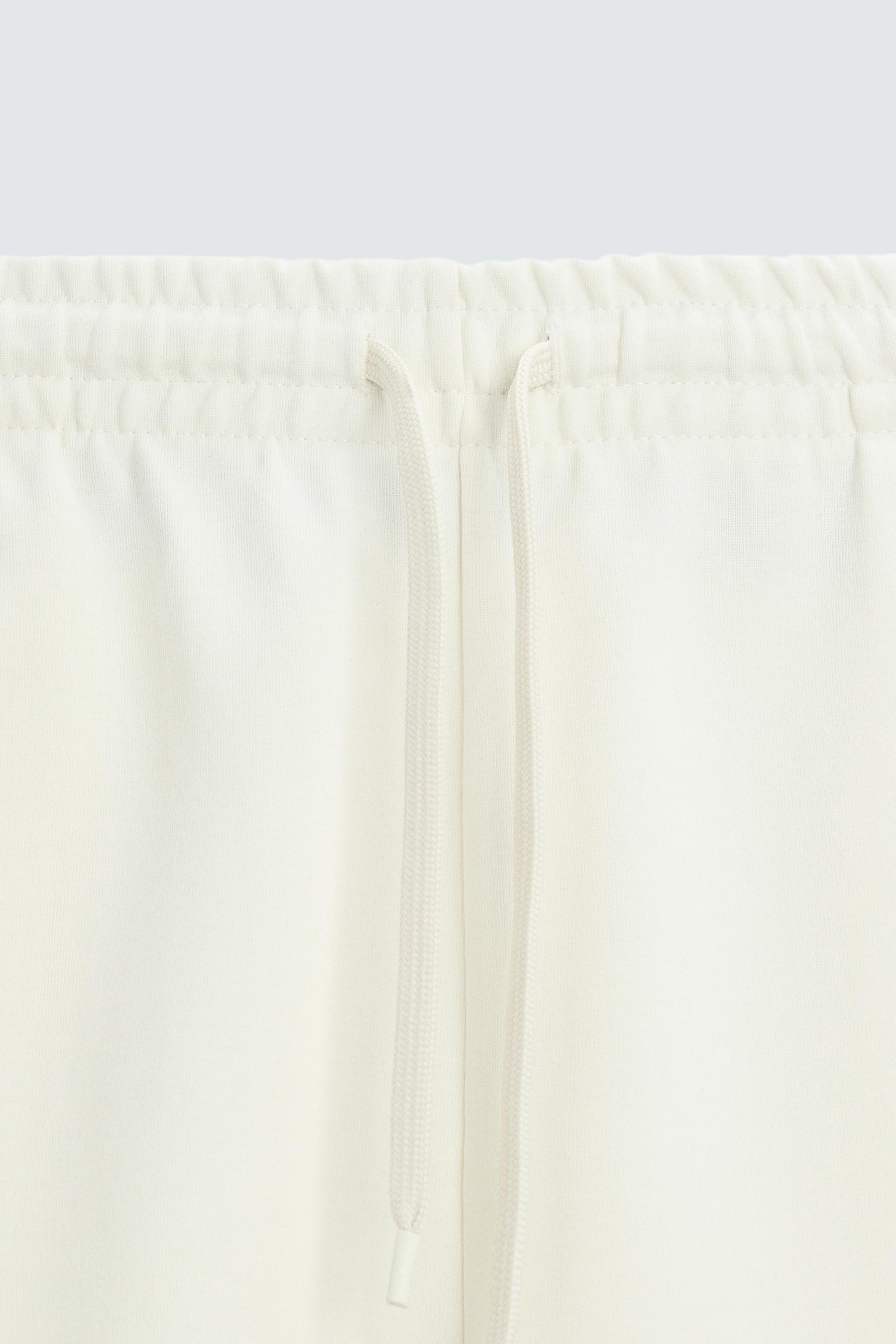 TECHNICAL INTERLOCK BERMUDA SHORTS - Image 8
