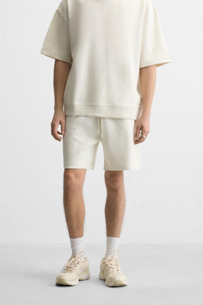 TECHNICAL INTERLOCK BERMUDA SHORTS - Image 2