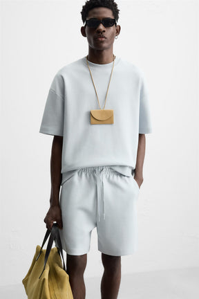 TECHNICAL INTERLOCK BERMUDA SHORTS - Image 5