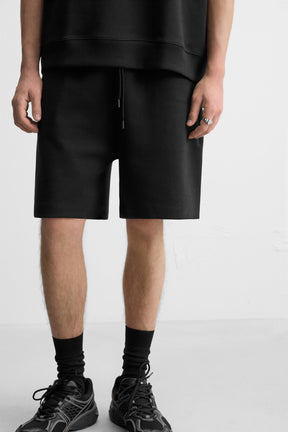 TECHNICAL INTERLOCK BERMUDA SHORTS - Image 5