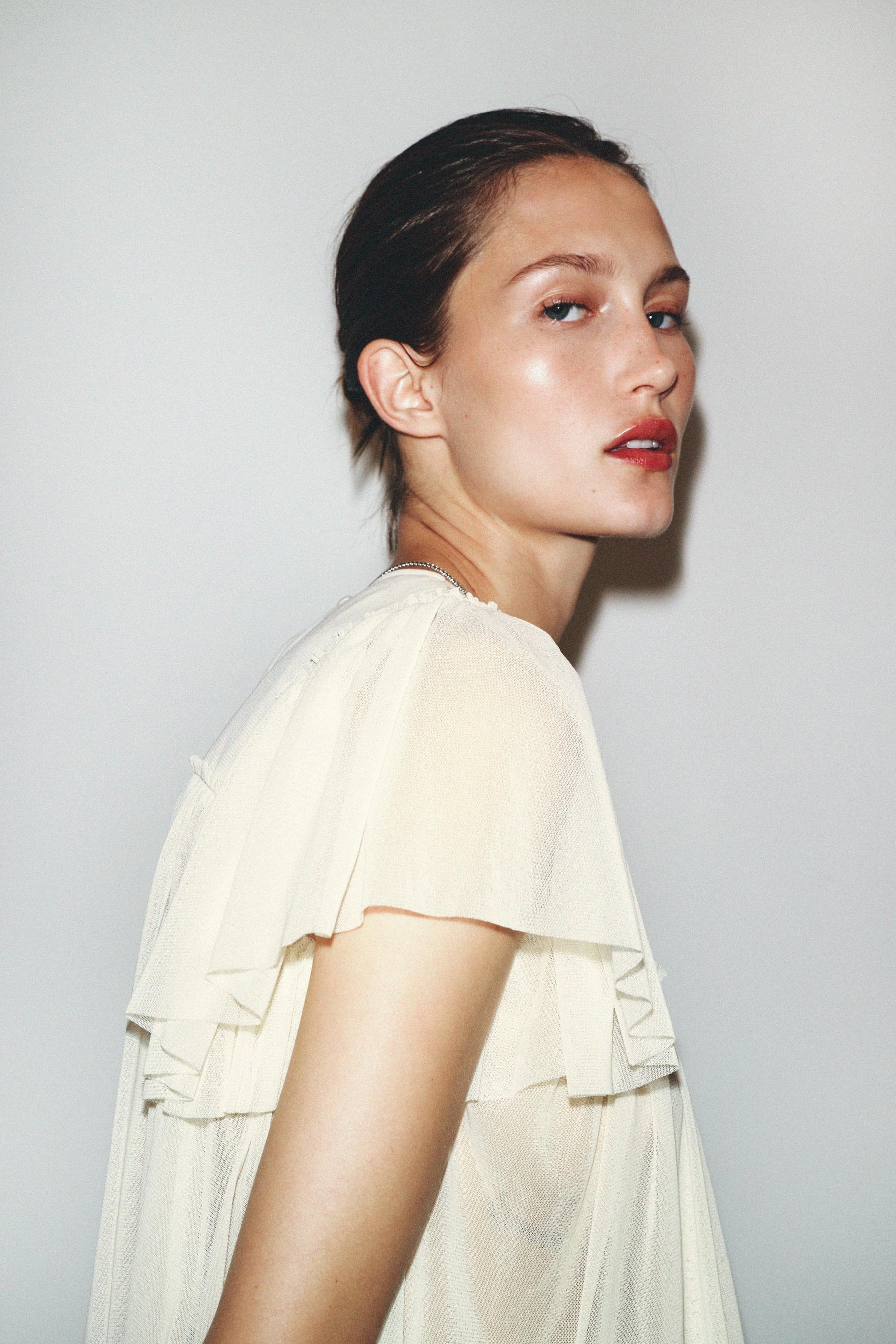 EMBROIDERED FLOWING BLOUSE