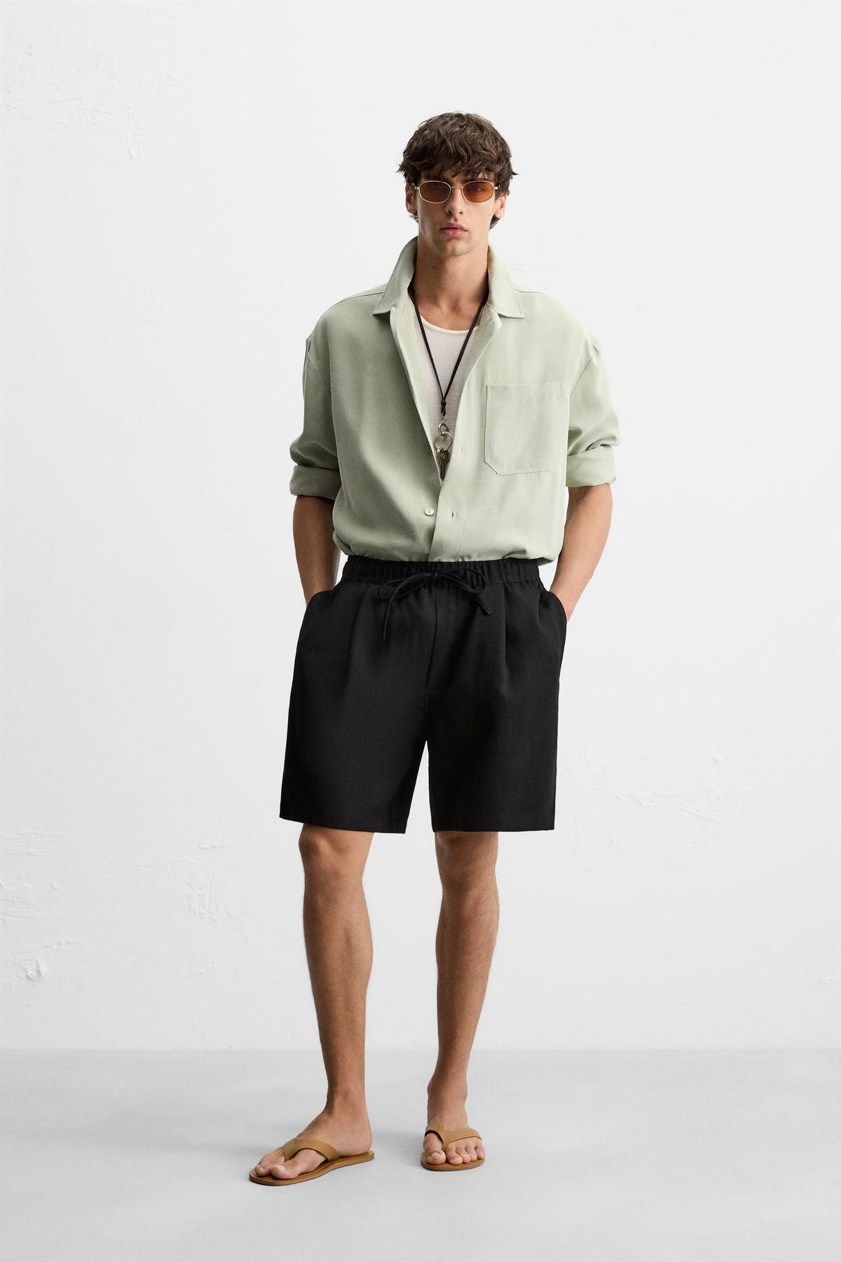 PLEATED FLOWING BERMUDA SHORTS - Image 1