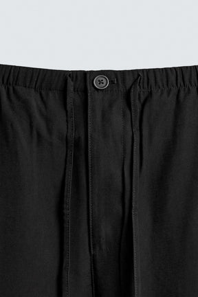 RELAXED FIT FLOWING TROUSERS - Image 9