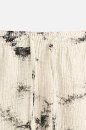 TIE DYE PRINTED TEXTURED TROUSERS - Image 9