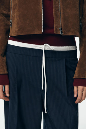 Wide-leg trousers with waistband.