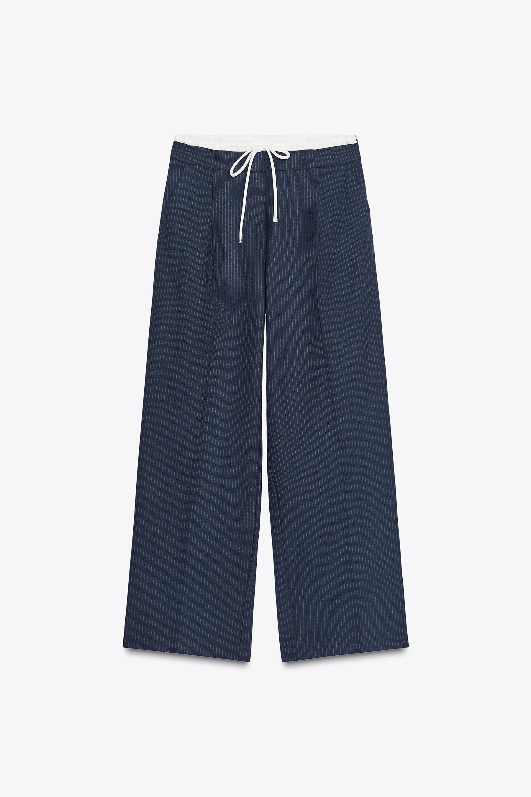 Wide-leg trousers with waistband.