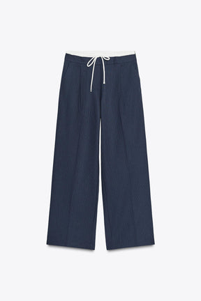Wide-leg trousers with waistband.