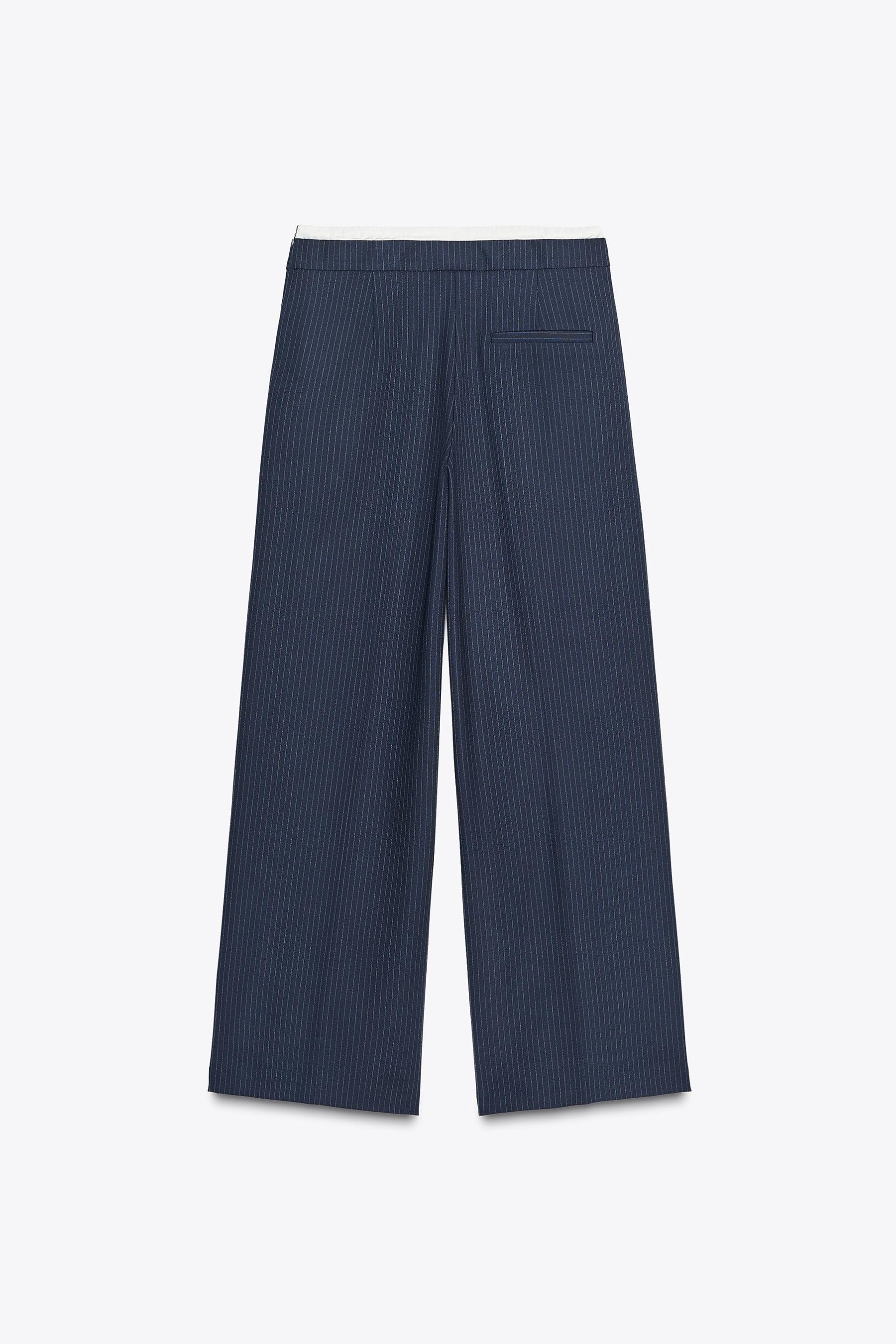 Wide-leg trousers with waistband.
