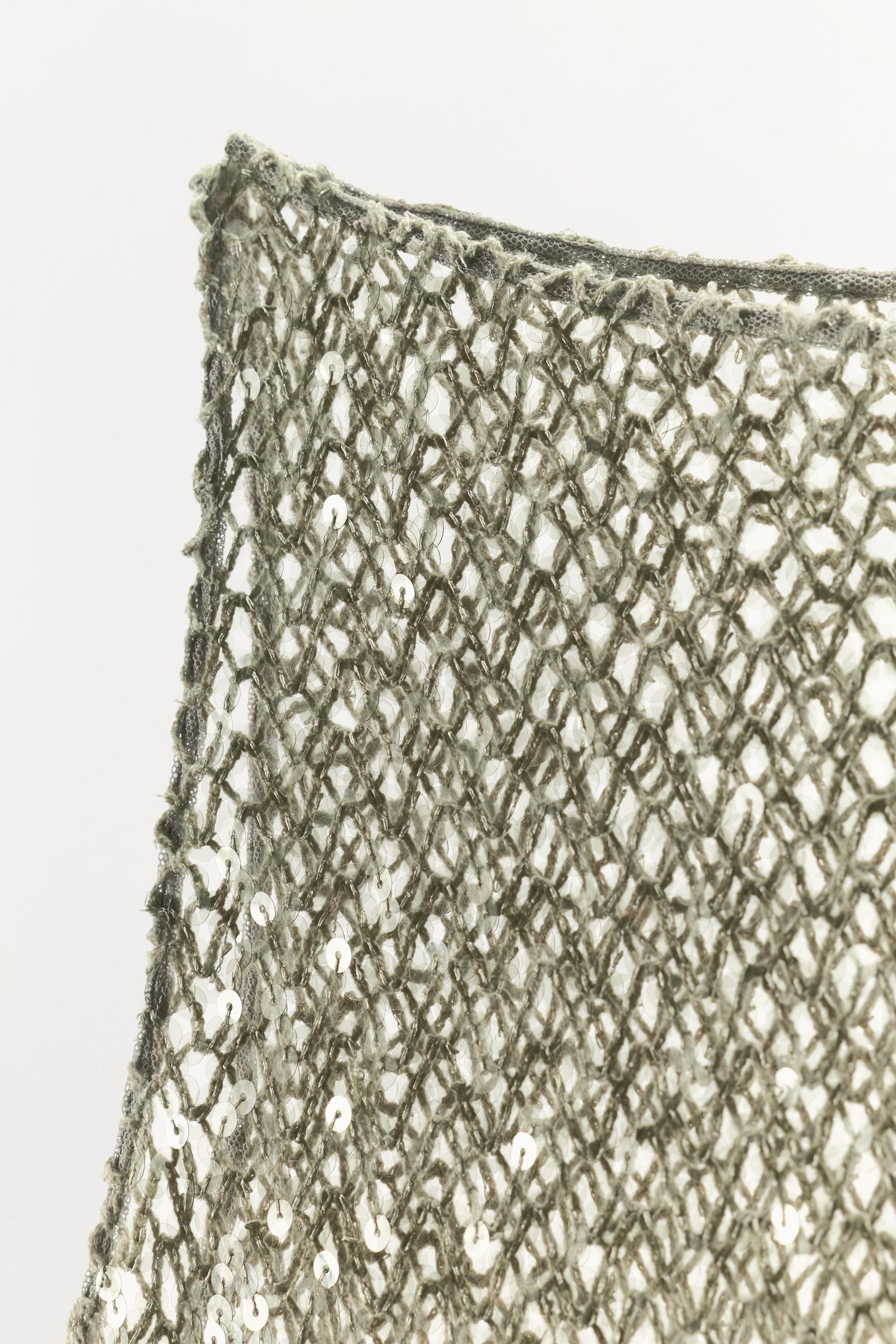 Sequinned Asymmetric Top