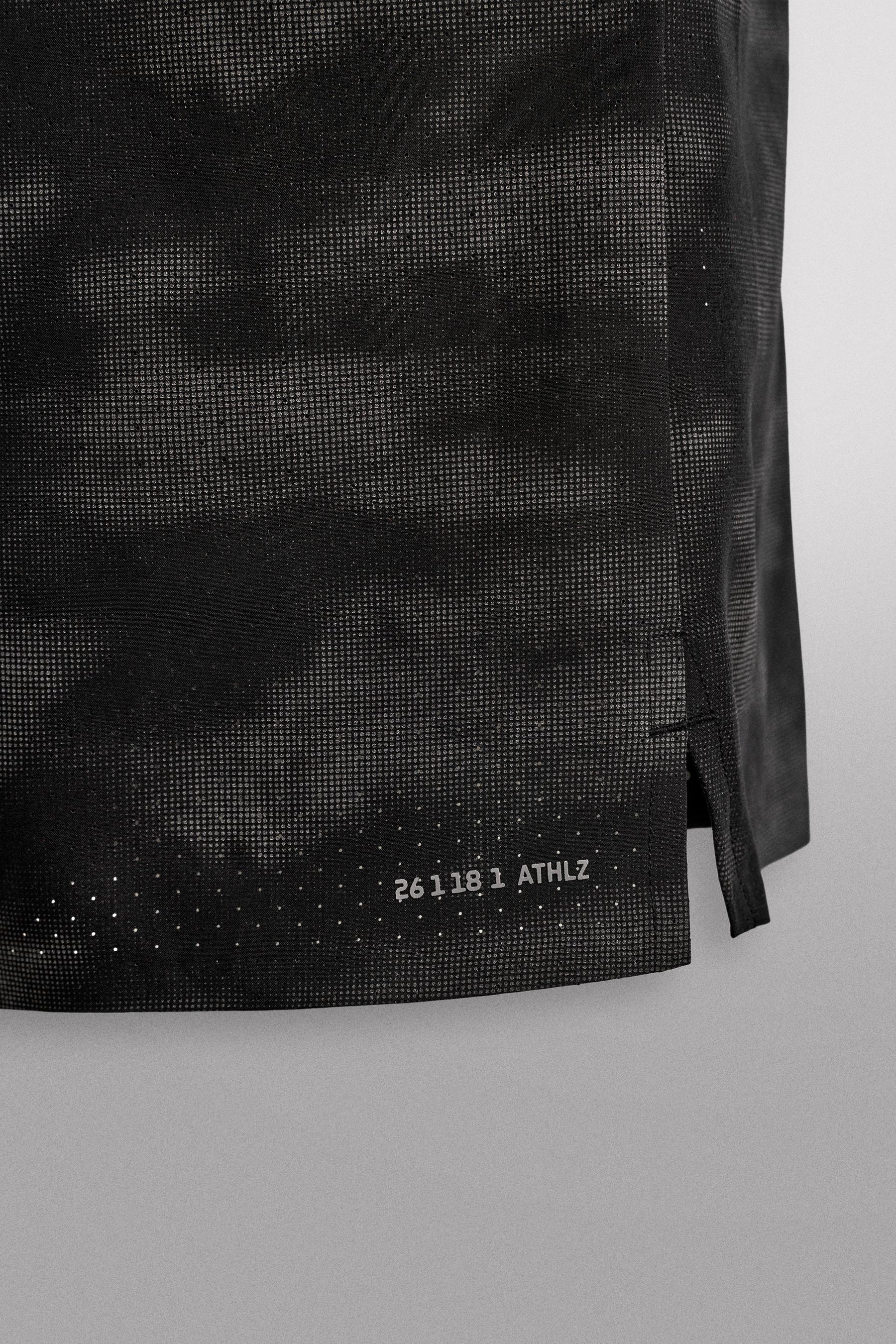 PERFORATED RUNNING SHORTS - Image 9