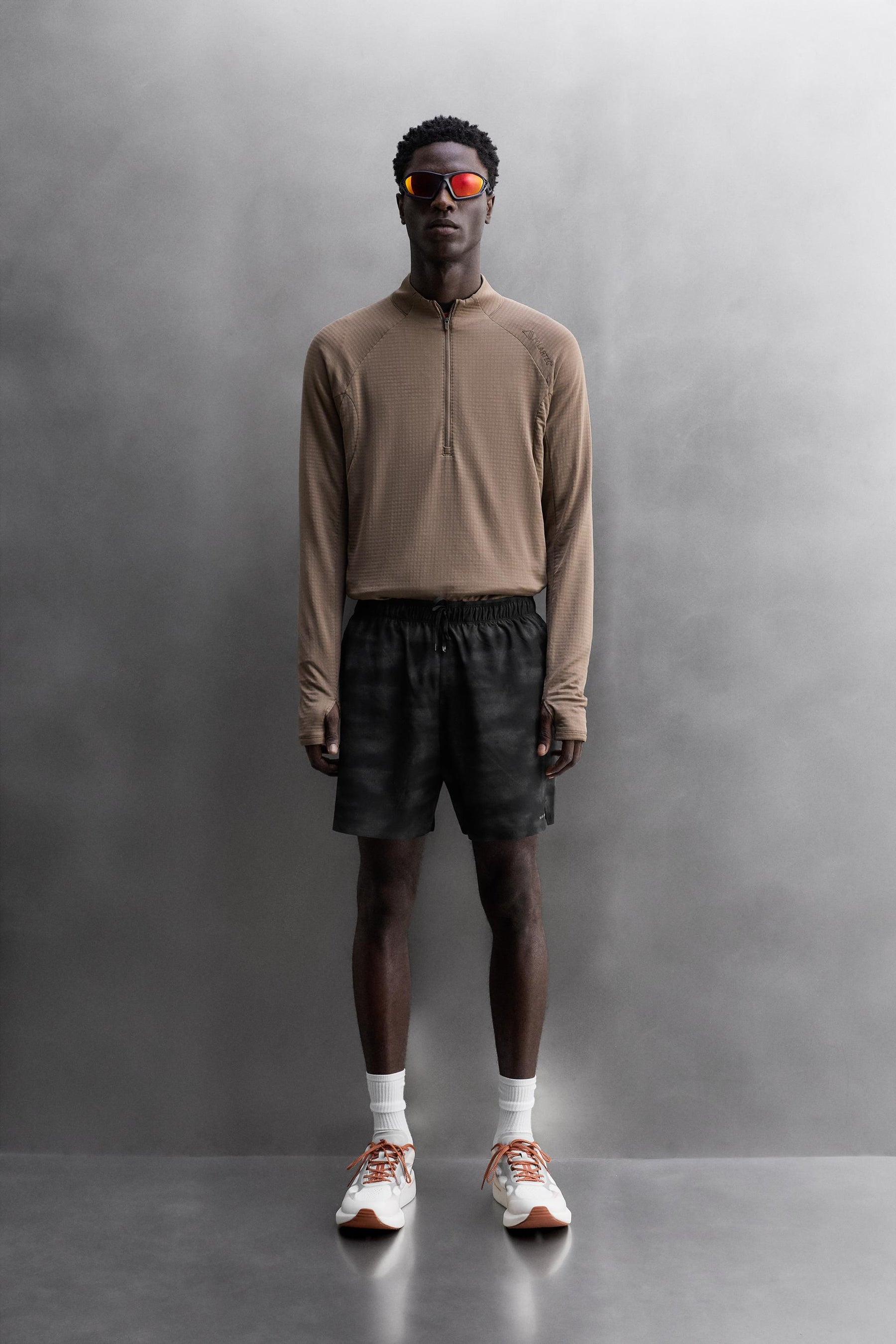 PERFORATED RUNNING SHORTS - Image 1