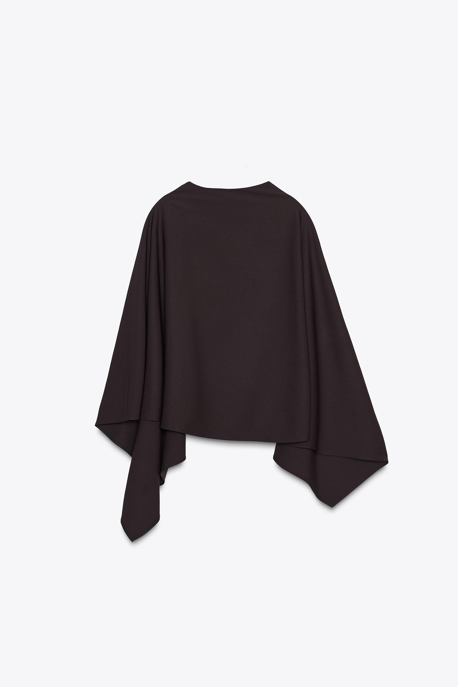 ASYMMETRIC BUTTON CAPE