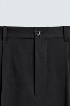 PLEATED TEXTURED TROUSERS - Image 9