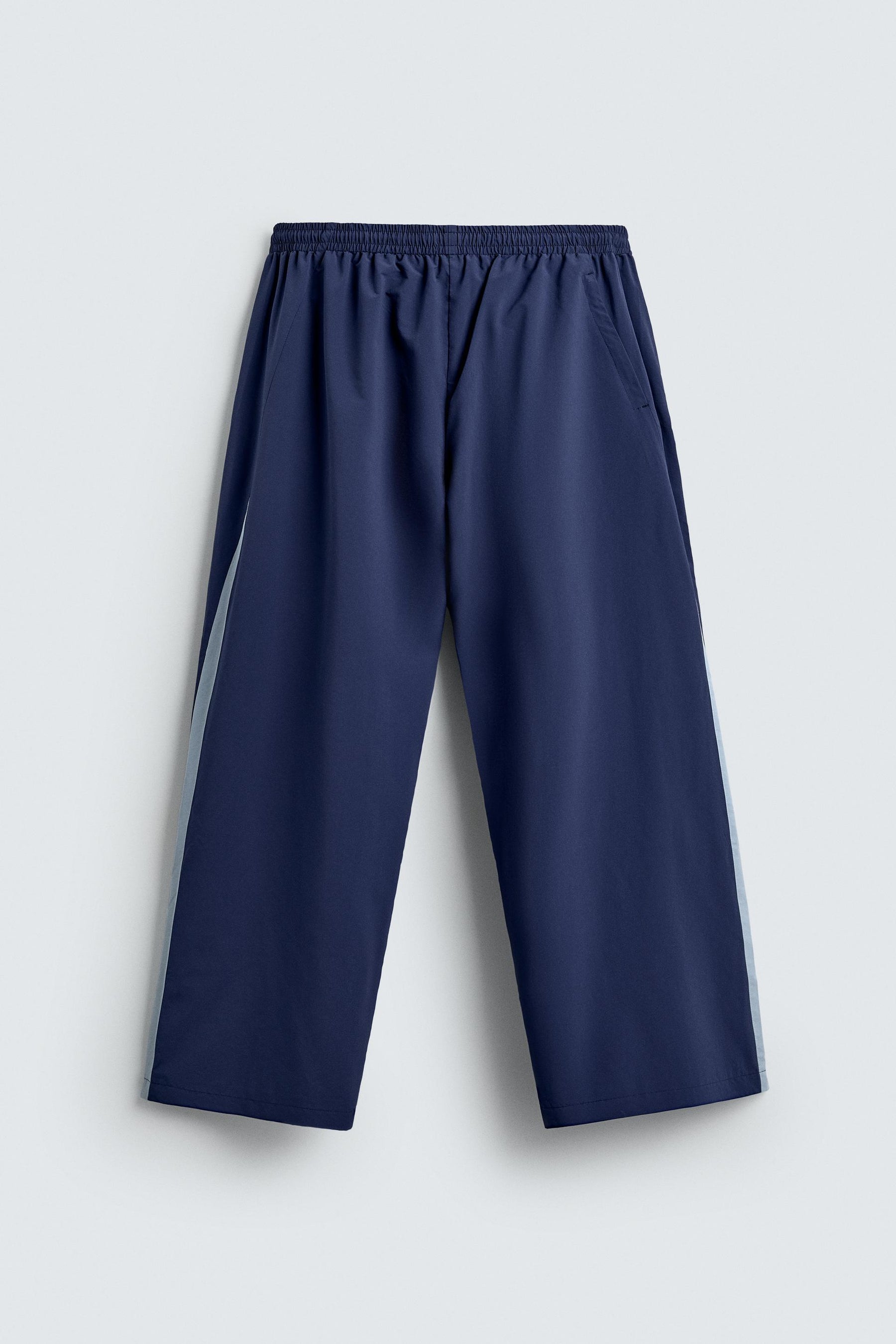 TECHNICAL TROUSERS WITH TAPING - Image 8