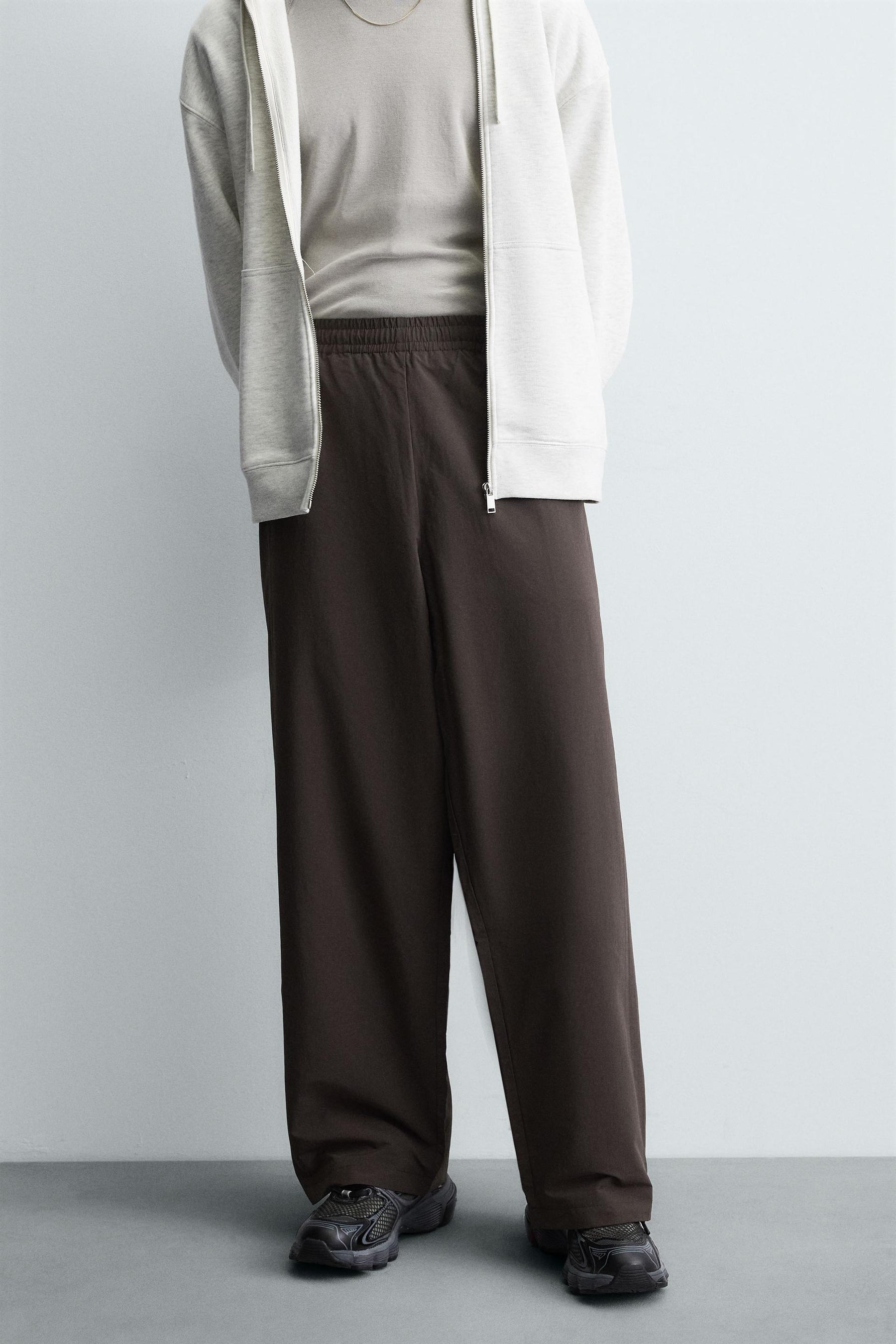 TECHNICAL TROUSERS WITH TAPING - Image 2