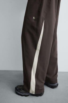 TECHNICAL TROUSERS WITH TAPING - Image 5
