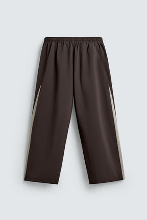 TECHNICAL TROUSERS WITH TAPING - Image 8