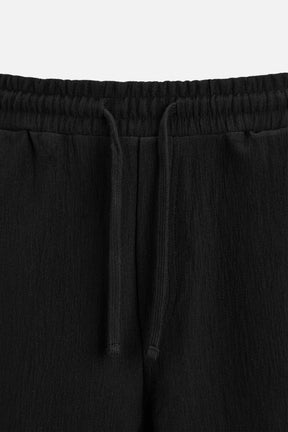 TEXTURED JOGGER BERMUDA SHORTS - Image 8