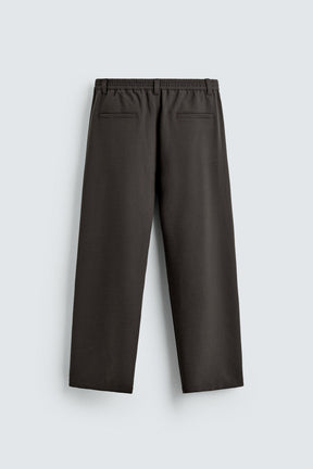 RELAXED FIT PLEATED TROUSERS - Image 8