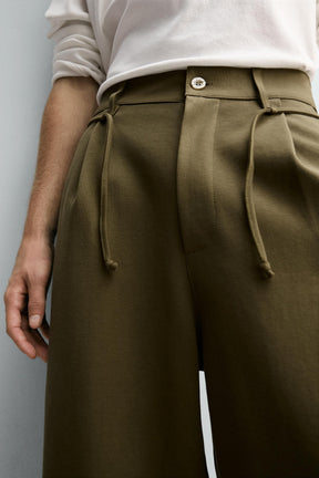 PLEATED DRAWSTRING TROUSERS - Image 6