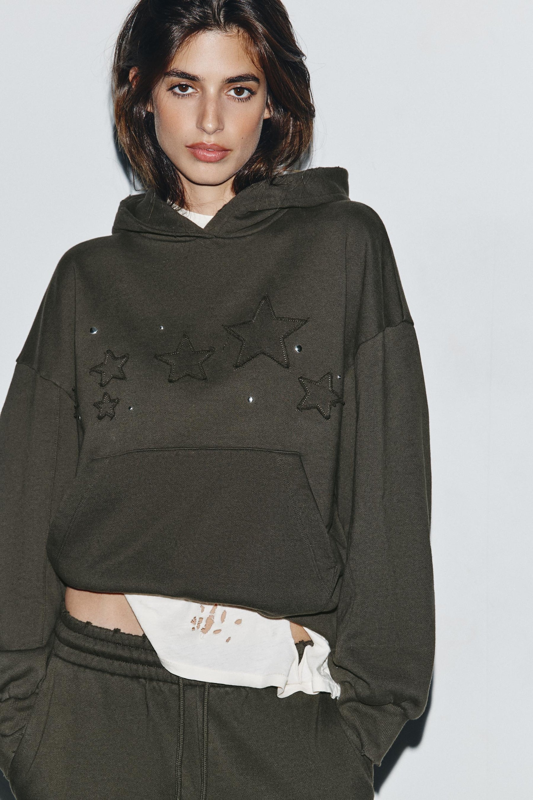 WASHED STUDDED SWEATSHIRT