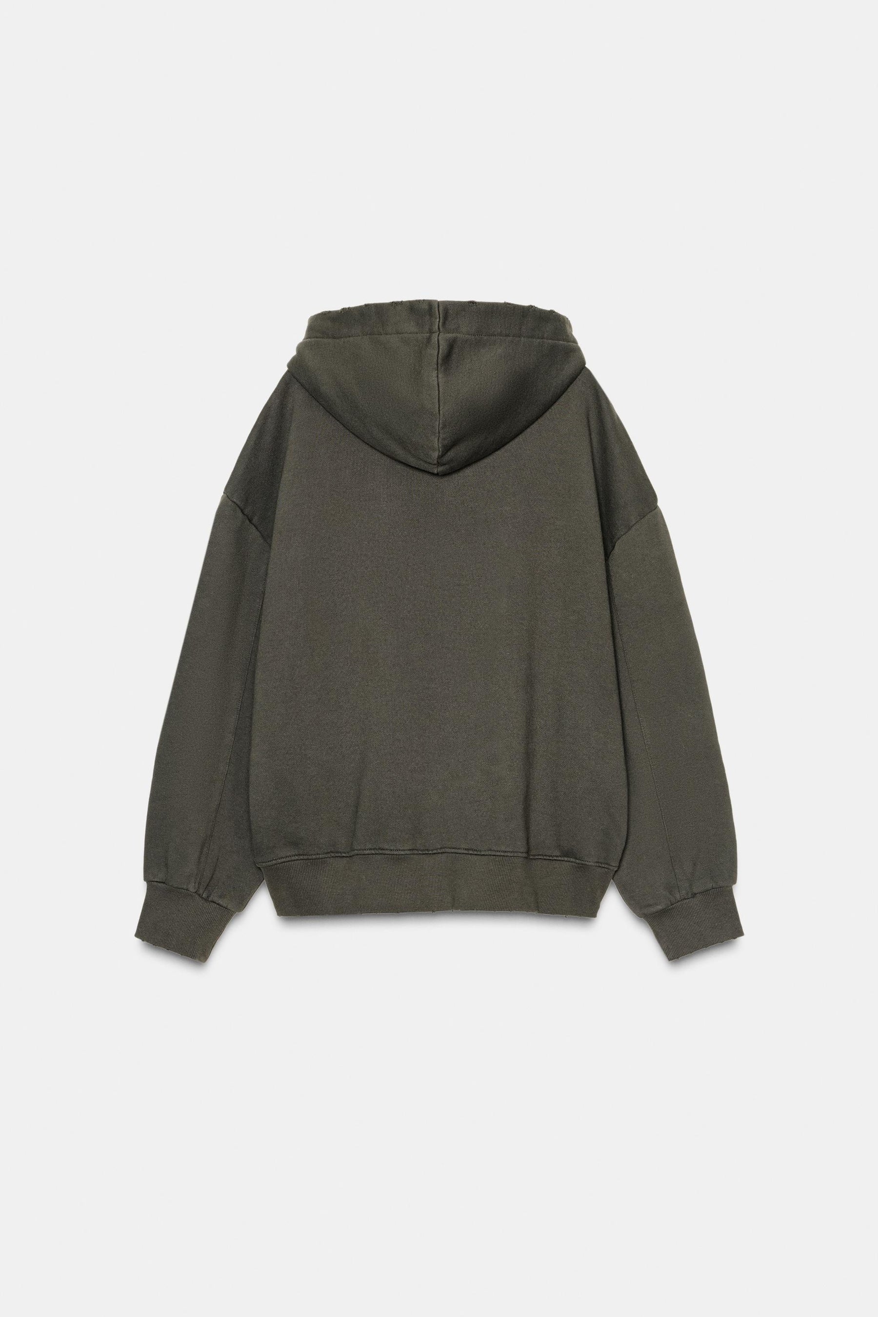 WASHED STUDDED SWEATSHIRT