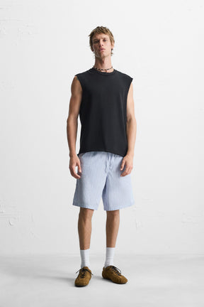 IRREGULAR KNIT TANK TOP - Image 1