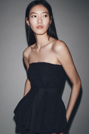 KNIT PEPLUM TOP WITH BOW - Image 1