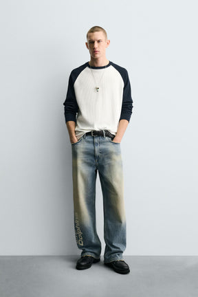 RELAXED FIT EMBROIDERED NFL MIAMI DOLPHINS JEANS - Image 1