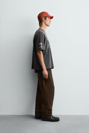 T-SHIRT WITH LOGO GRAPHICS - Image 4