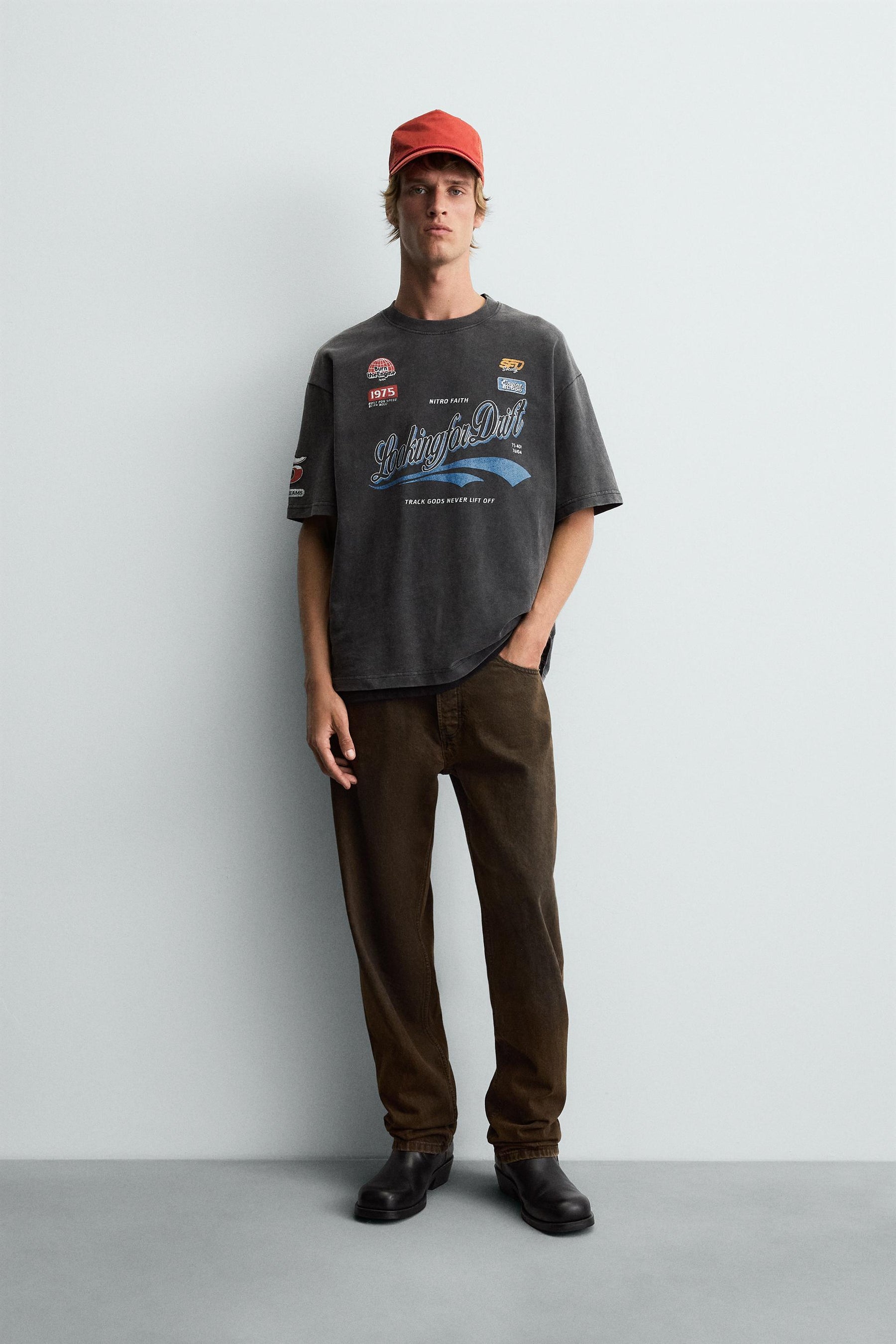 T-SHIRT WITH LOGO GRAPHICS - Image 1