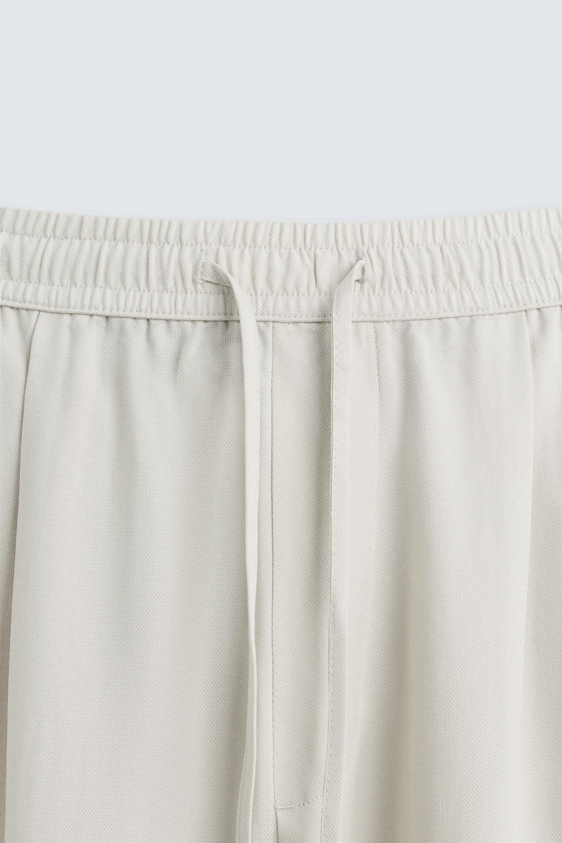 RELAXED FIT FLOWING TROUSERS - Image 8