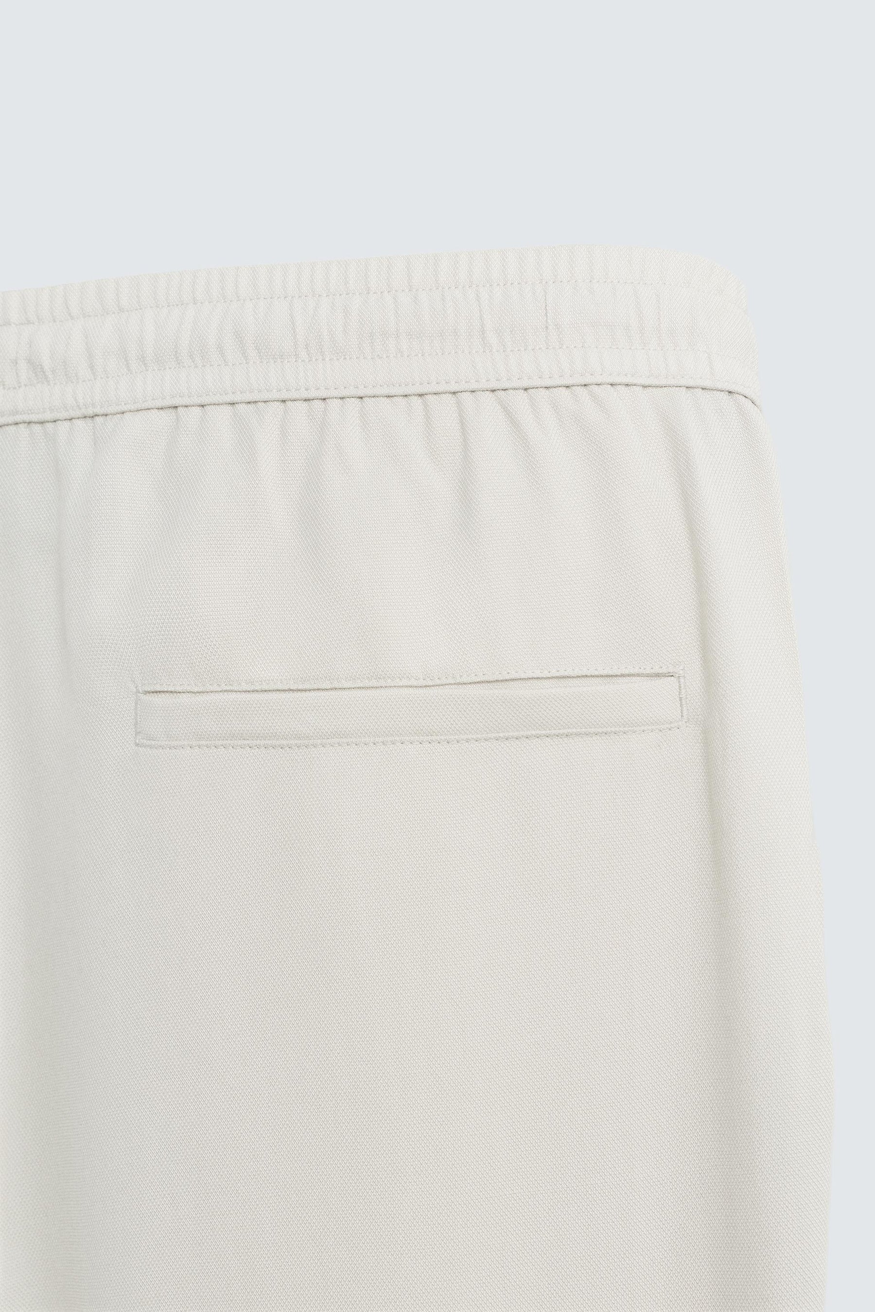 RELAXED FIT FLOWING TROUSERS - Image 9