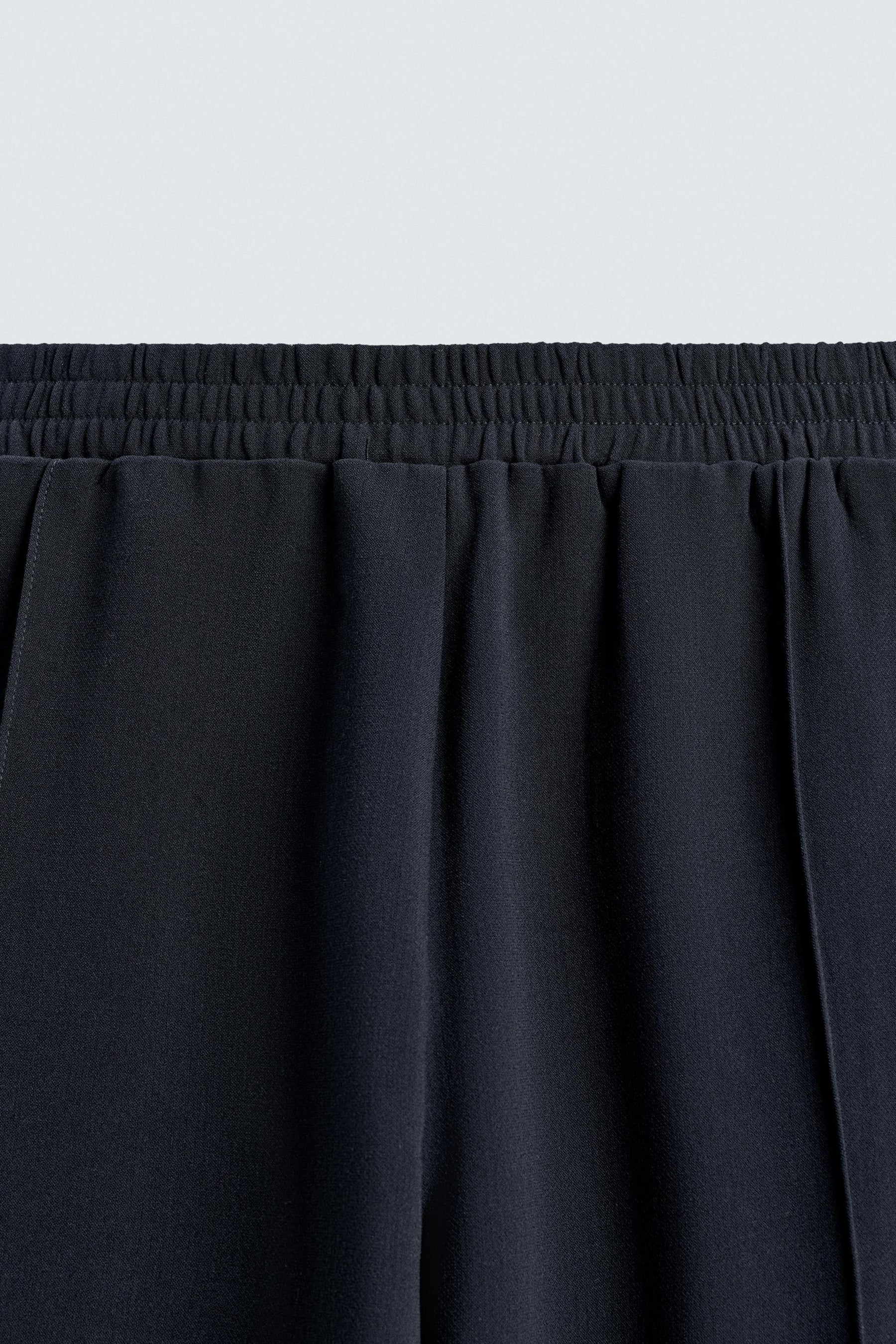 FLOWING TROUSERS WITH ZIPS - Image 8