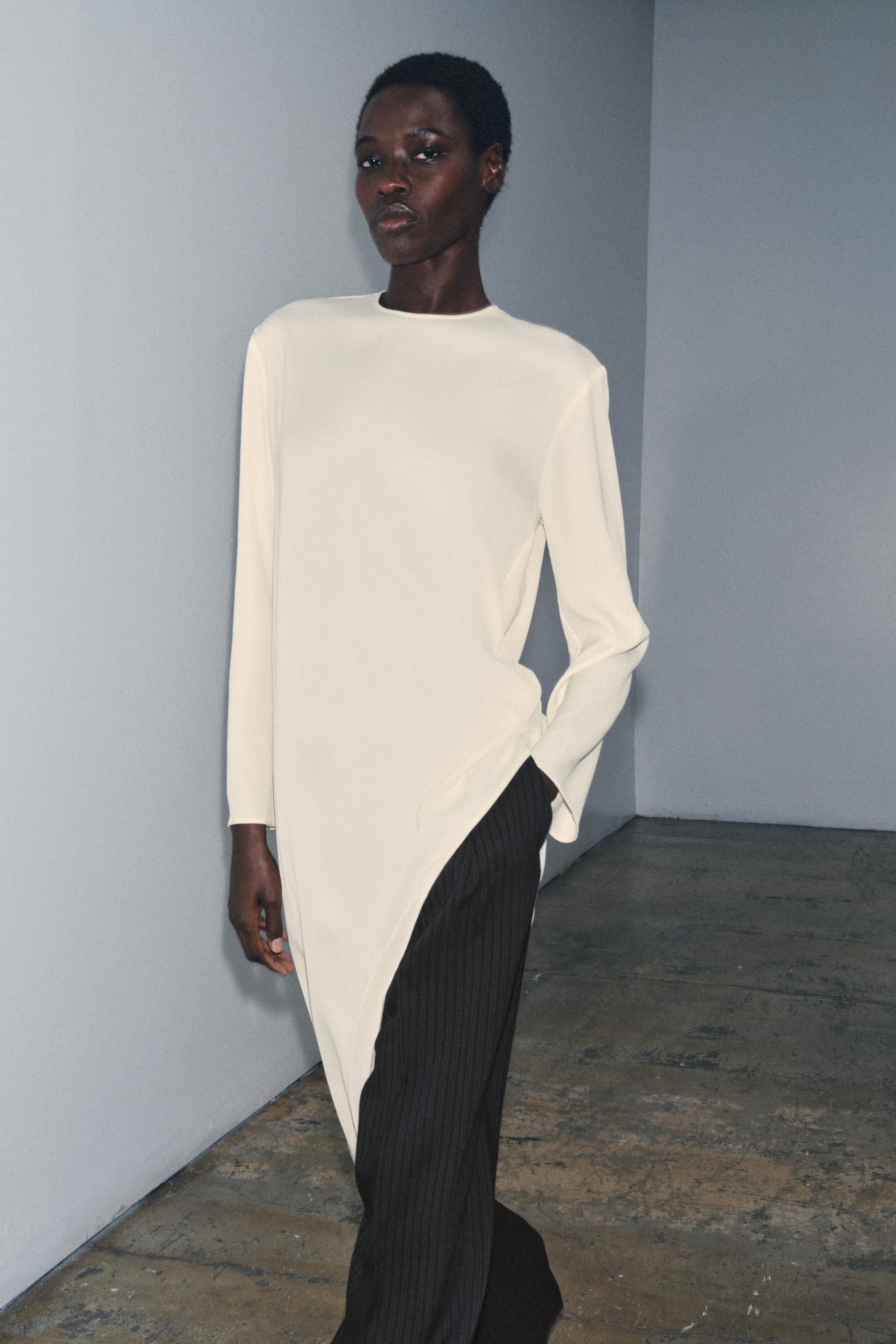 Asymmetric flowing blouse