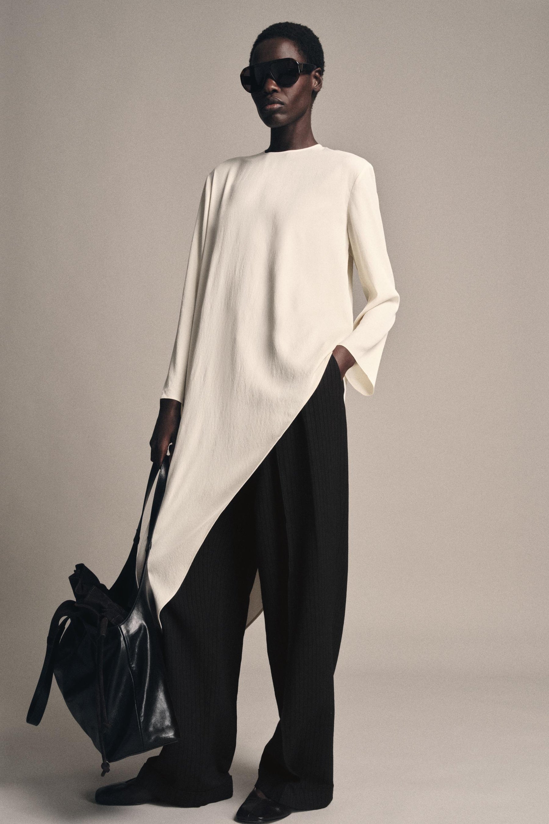 Asymmetric flowing blouse