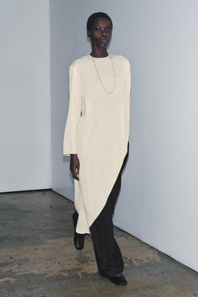 Asymmetric flowing blouse