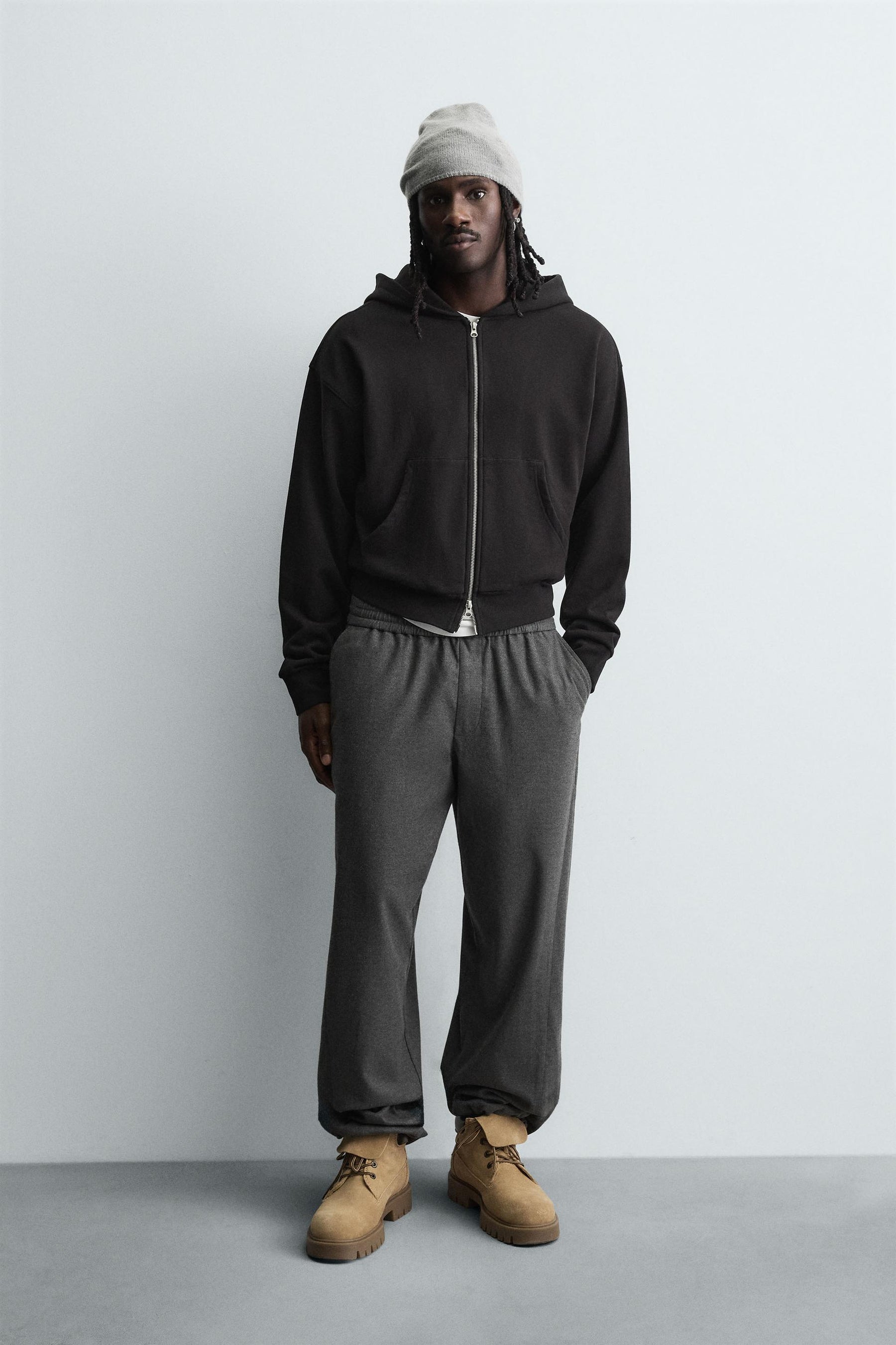 TEXTURED RELAXED FIT TROUSERS - Image 1