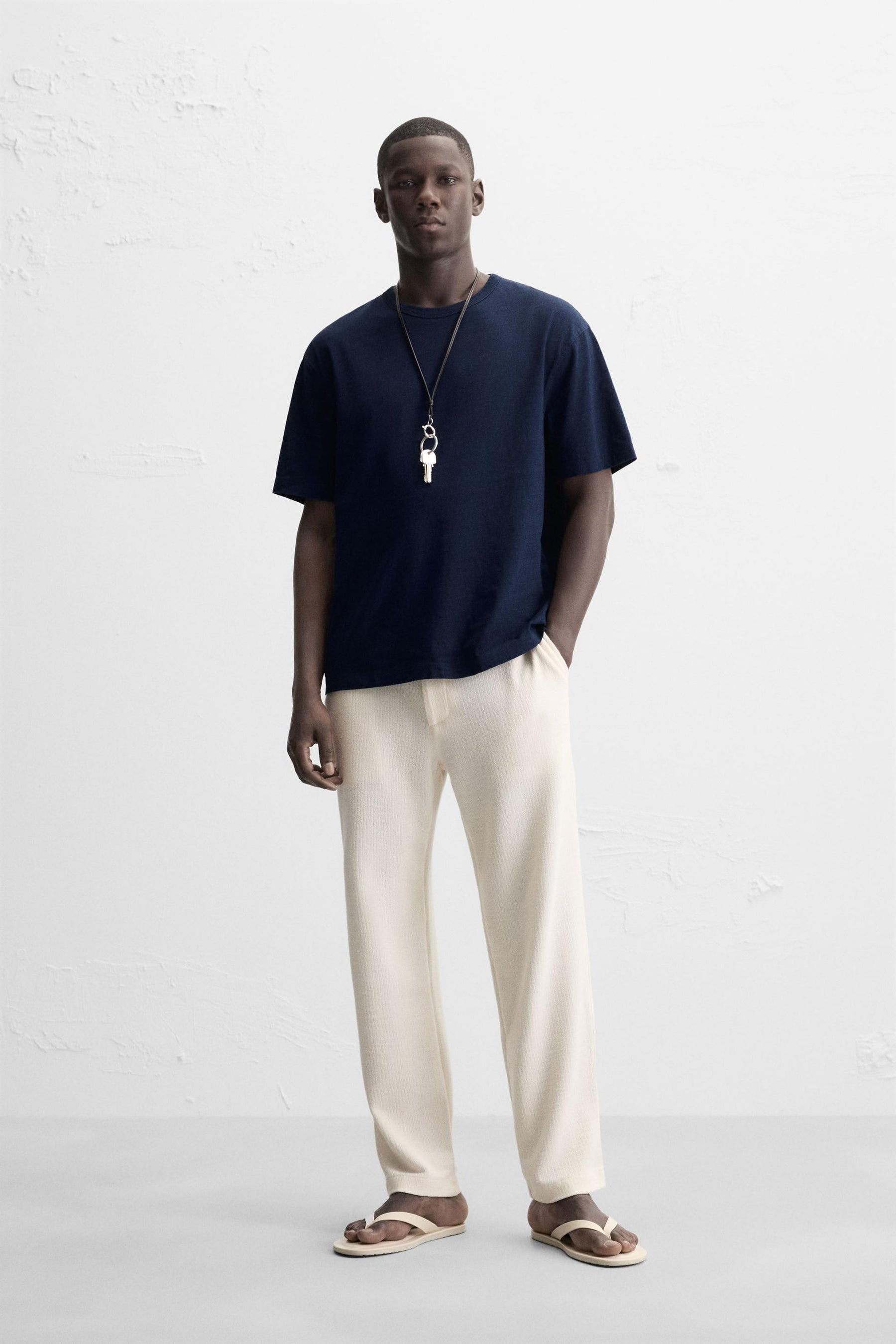 TEXTURED CHINO TROUSERS - Image 1