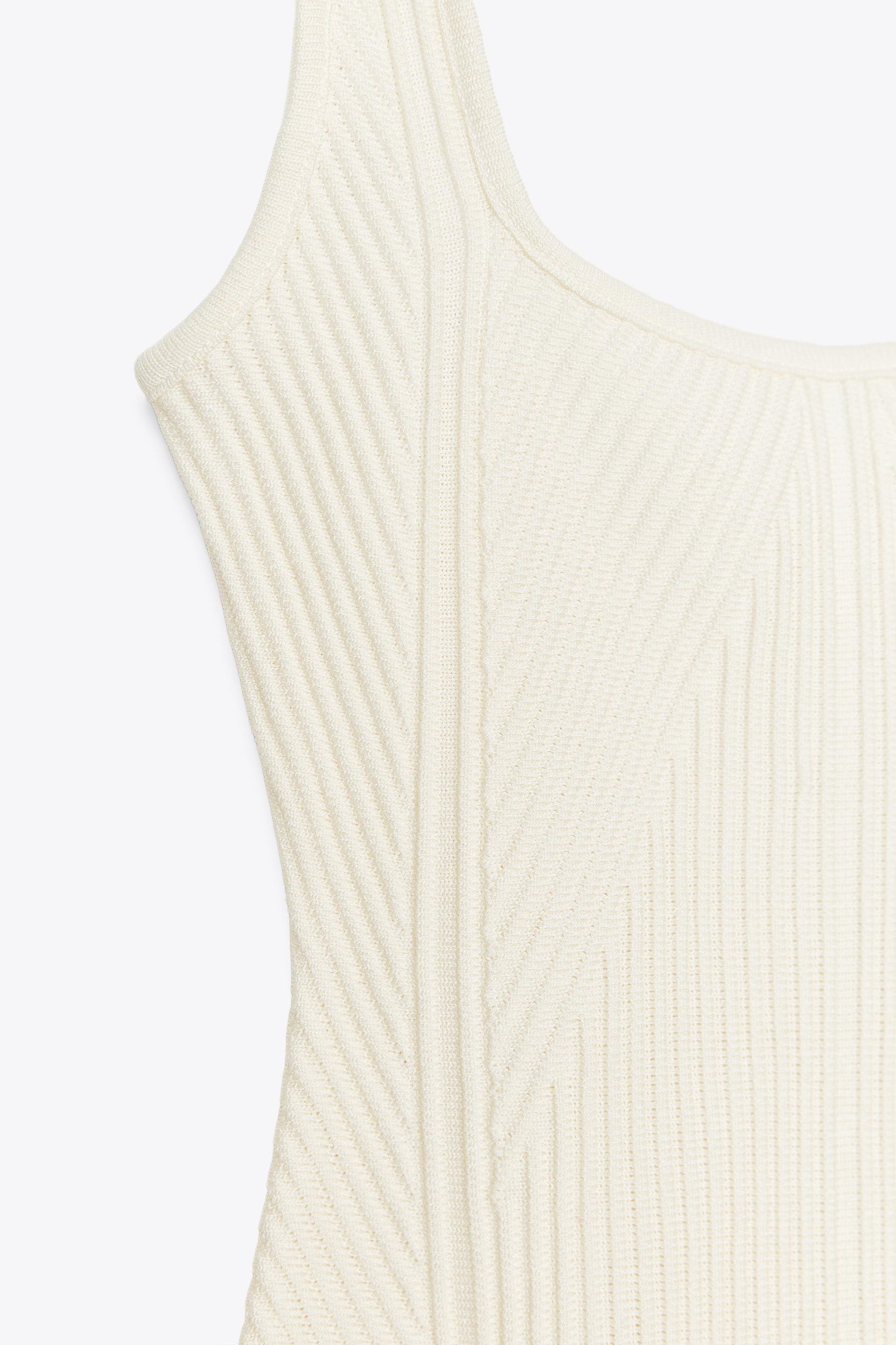 TEXTURED STRAPPY BODYSUIT