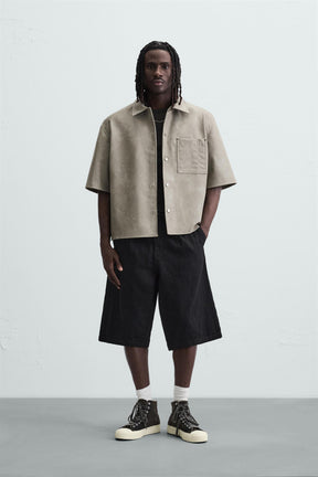 LEATHER EFFECT OVERSHIRT - Image 1