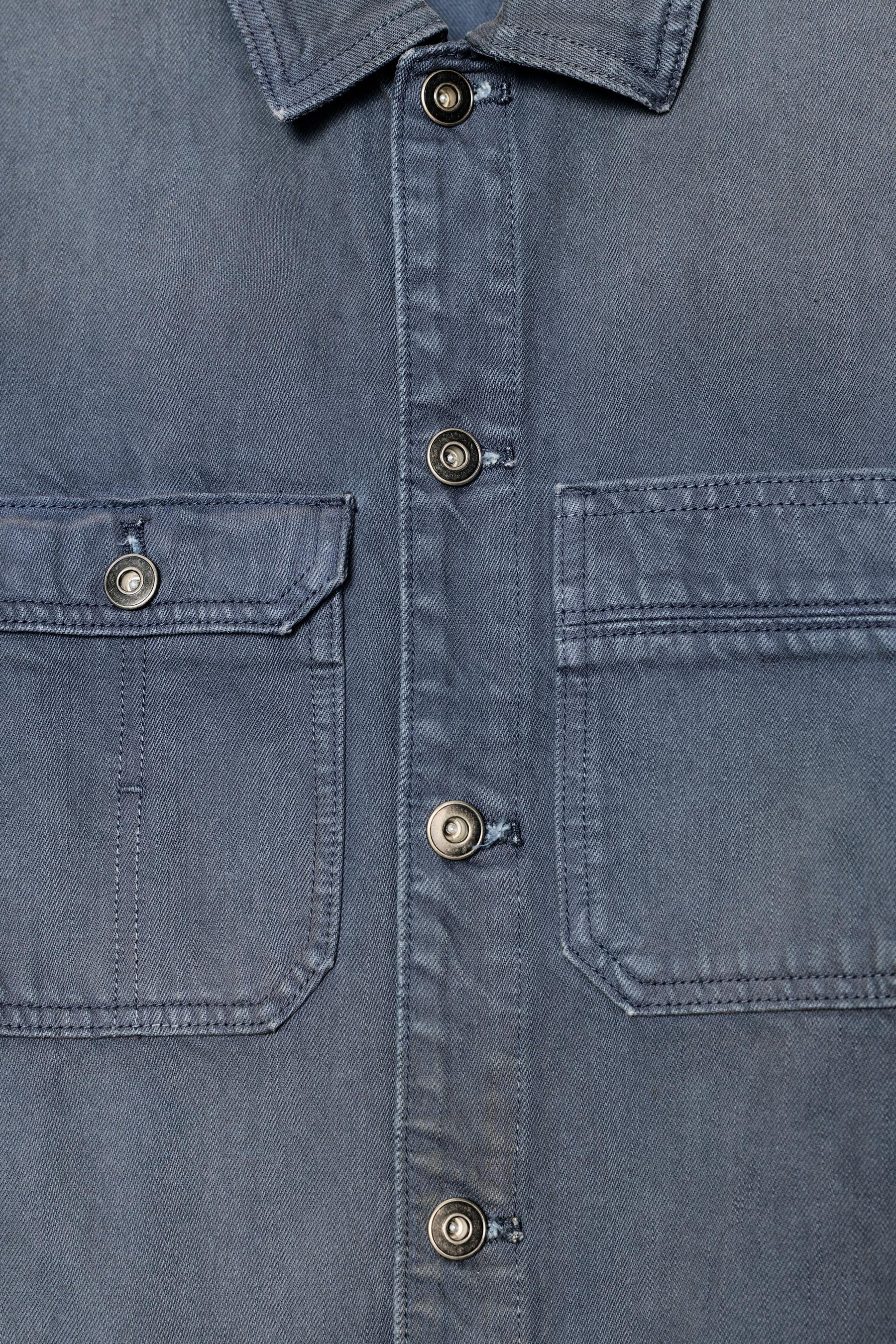 WASHED DENIM JUMPSUIT