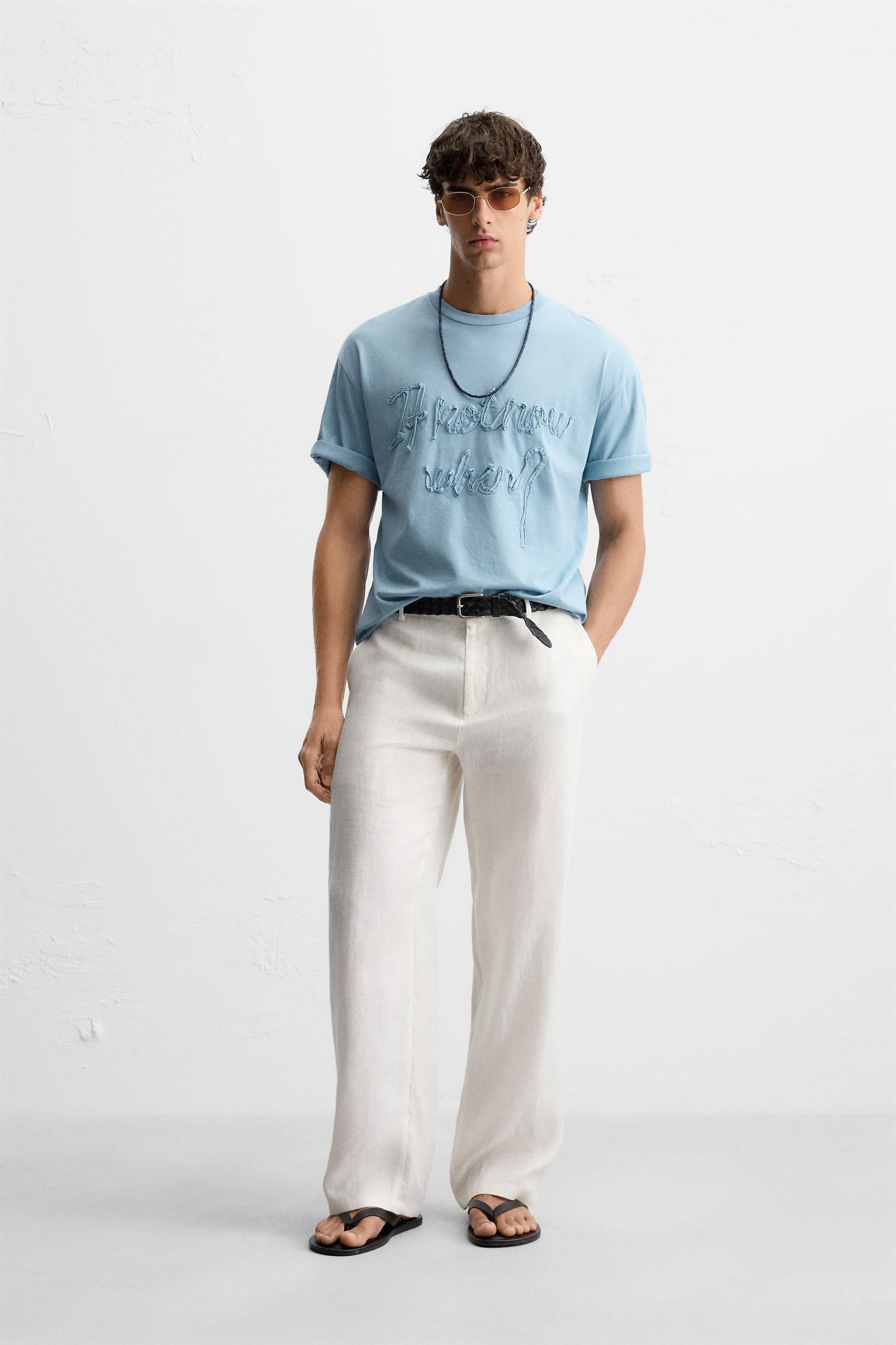 T-SHIRT WITH RAISED SLOGAN - Image 1